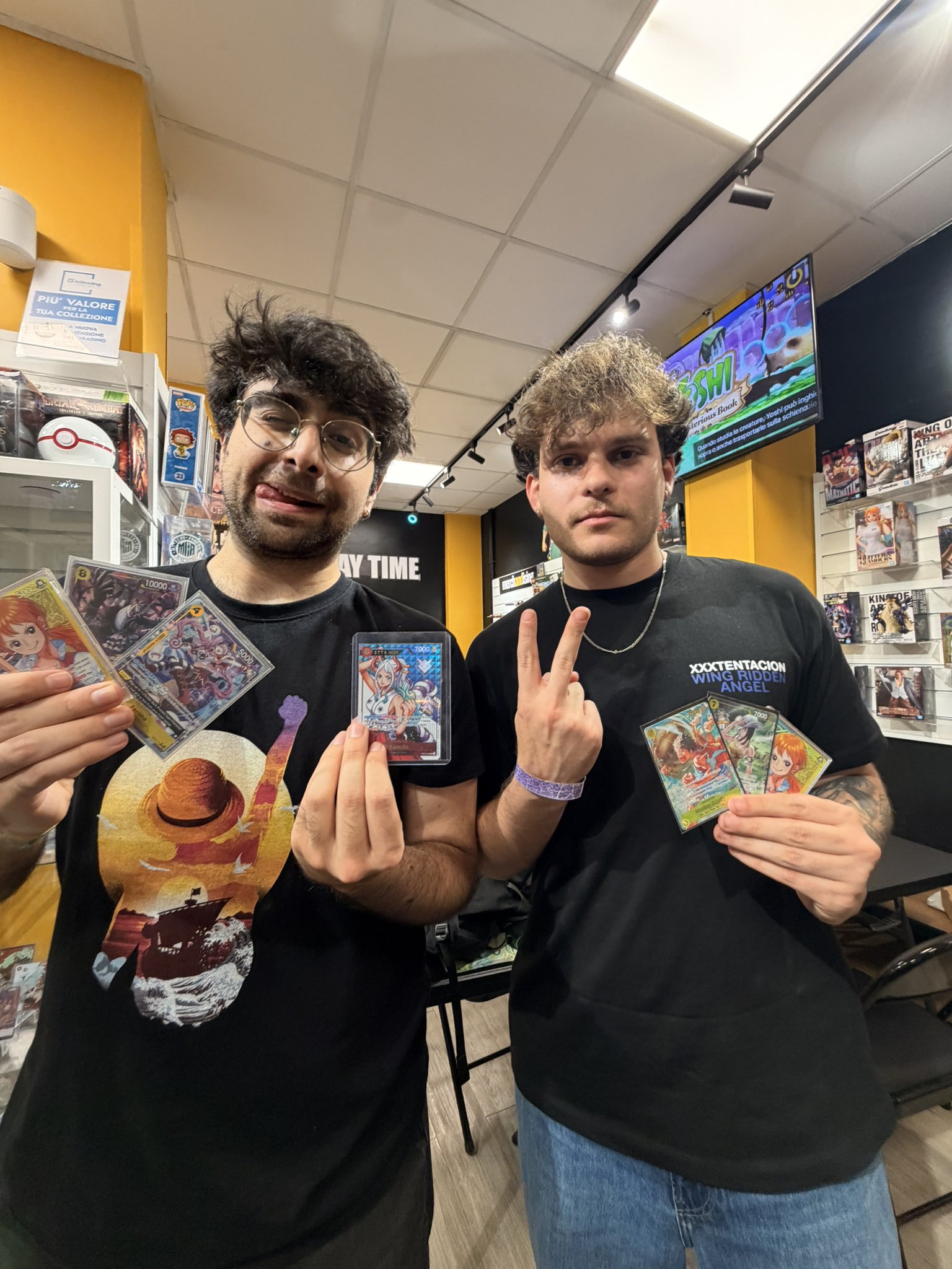 Valerio holding the Serial Yamato prize with another finalist